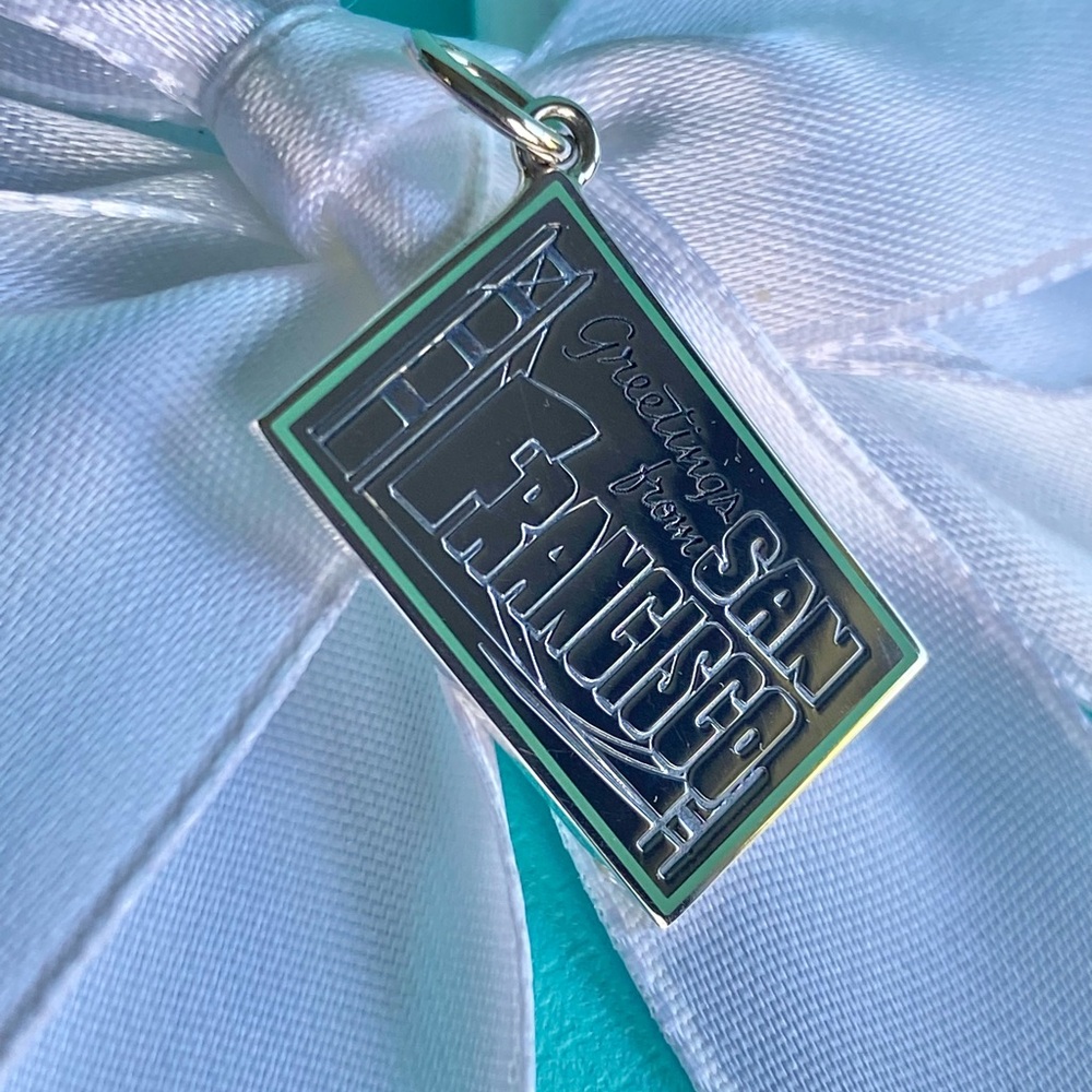 Tiffany & Co. New, Authentic Sterling Silver “Greeting from San Francisco”Charm.